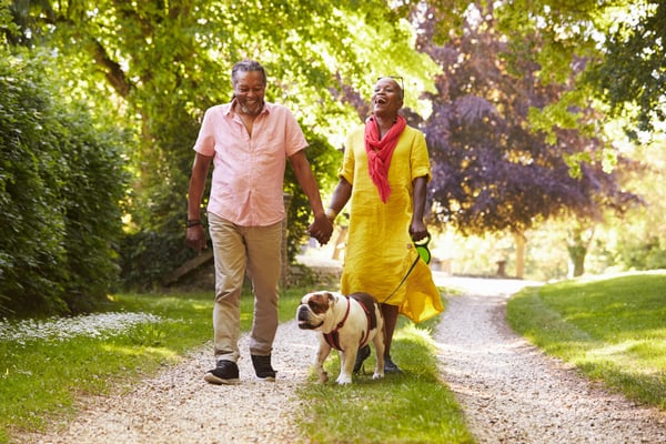 AA couple walking their dog