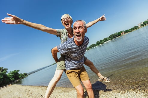 happy couple at lake