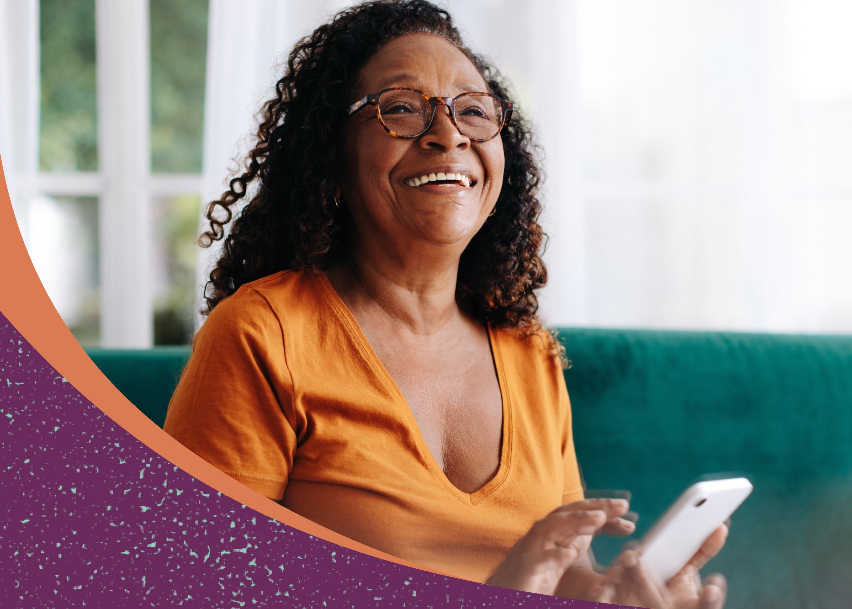 African American woman on smartphone at home